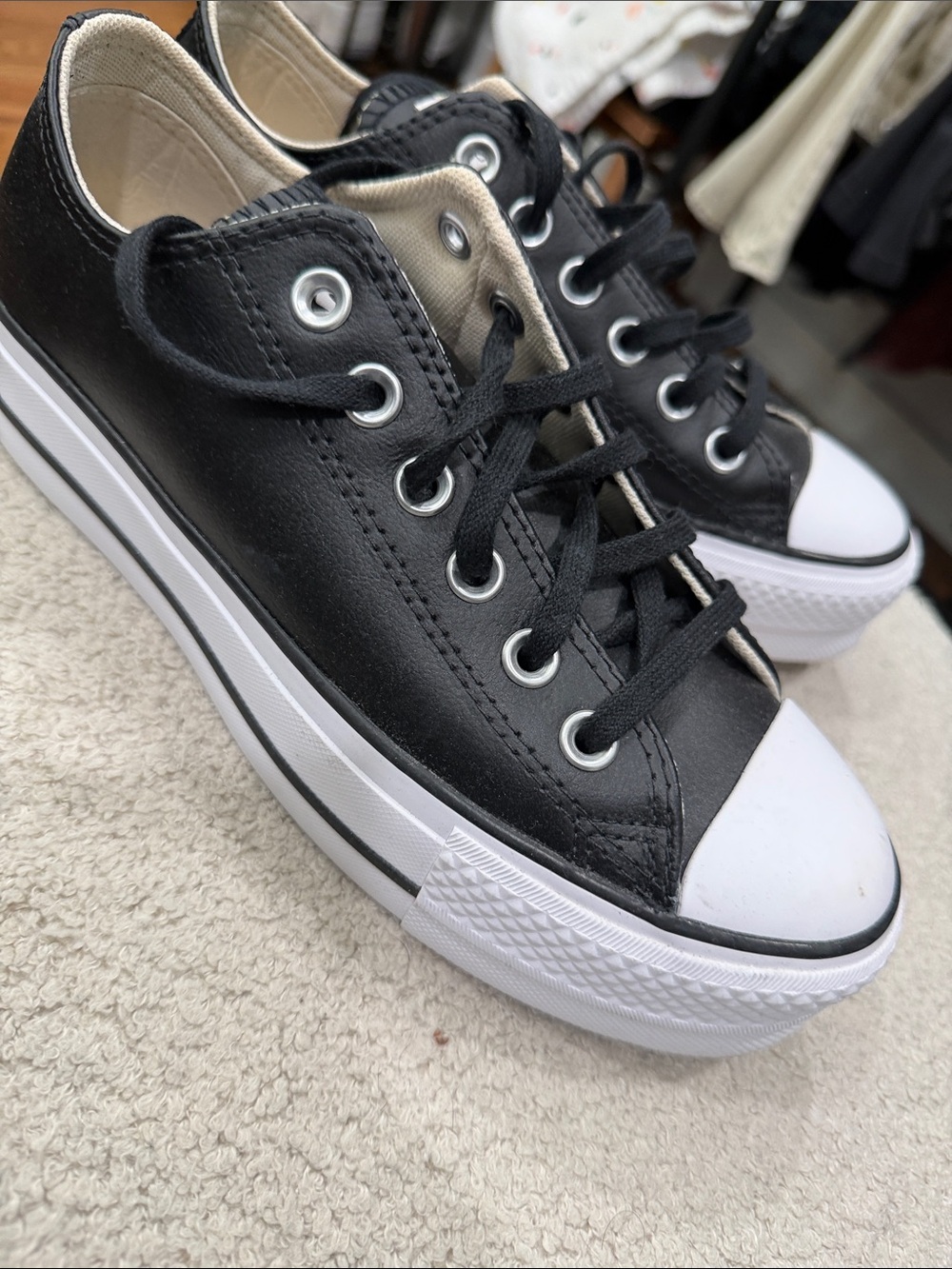 Converse women’s Black Low-Top Platform Sneakers with White Toe Cap